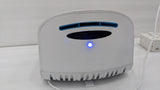 Underside of the Dolphy dome hand dryer showing the air outlet and sensor light