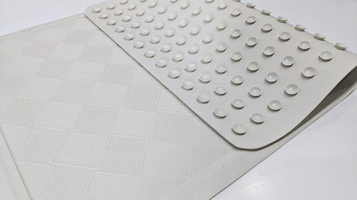 Close-up of the rows of suction cups on the underside of the Dolphy bath mat