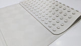 Close-up of the rows of suction cups on the underside of the Dolphy bath mat