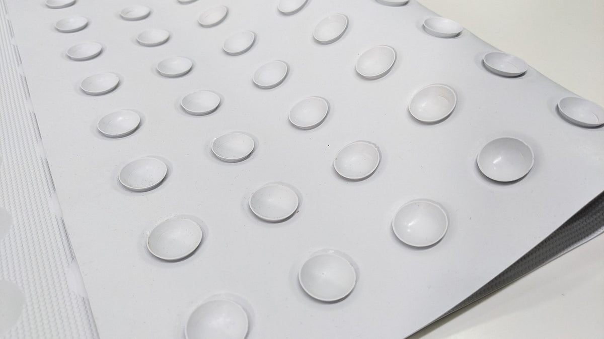 Close-up of the suction cups on the underside of the Dolphy rubber bath mat