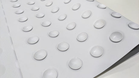 Close-up of the suction cups on the underside of the Dolphy rubber bath mat