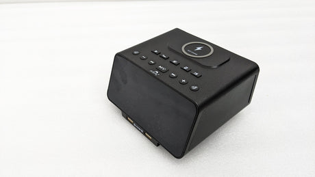 Dolphy black Bluetooth alarm clock dock, angled view showing the buttons.