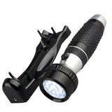 Dolphy LED emergency torch lifted from its wall bracket, showing the bright LED head
