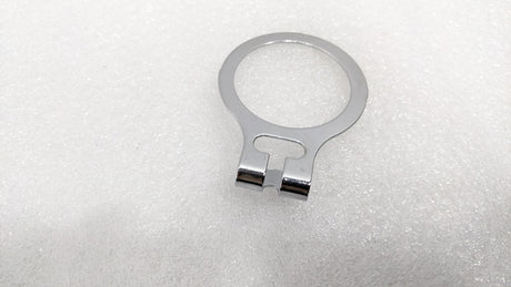 Close-up of the chrome anti-theft ring that stays on the wardrobe rail