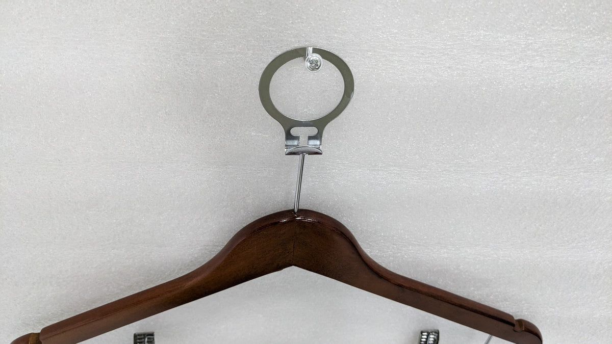 Close-up of the anti-theft ring on the Dolphy wooden security hanger