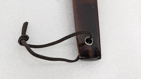Close-up of the leather hanging loop through the metal eyelet on the Dolphy shoe horn
