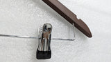Close-up of the chrome clip with rubber grip on the Dolphy wooden hanger