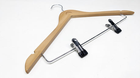 Dolphy natural wood hanger at an angle, showing the clip bar