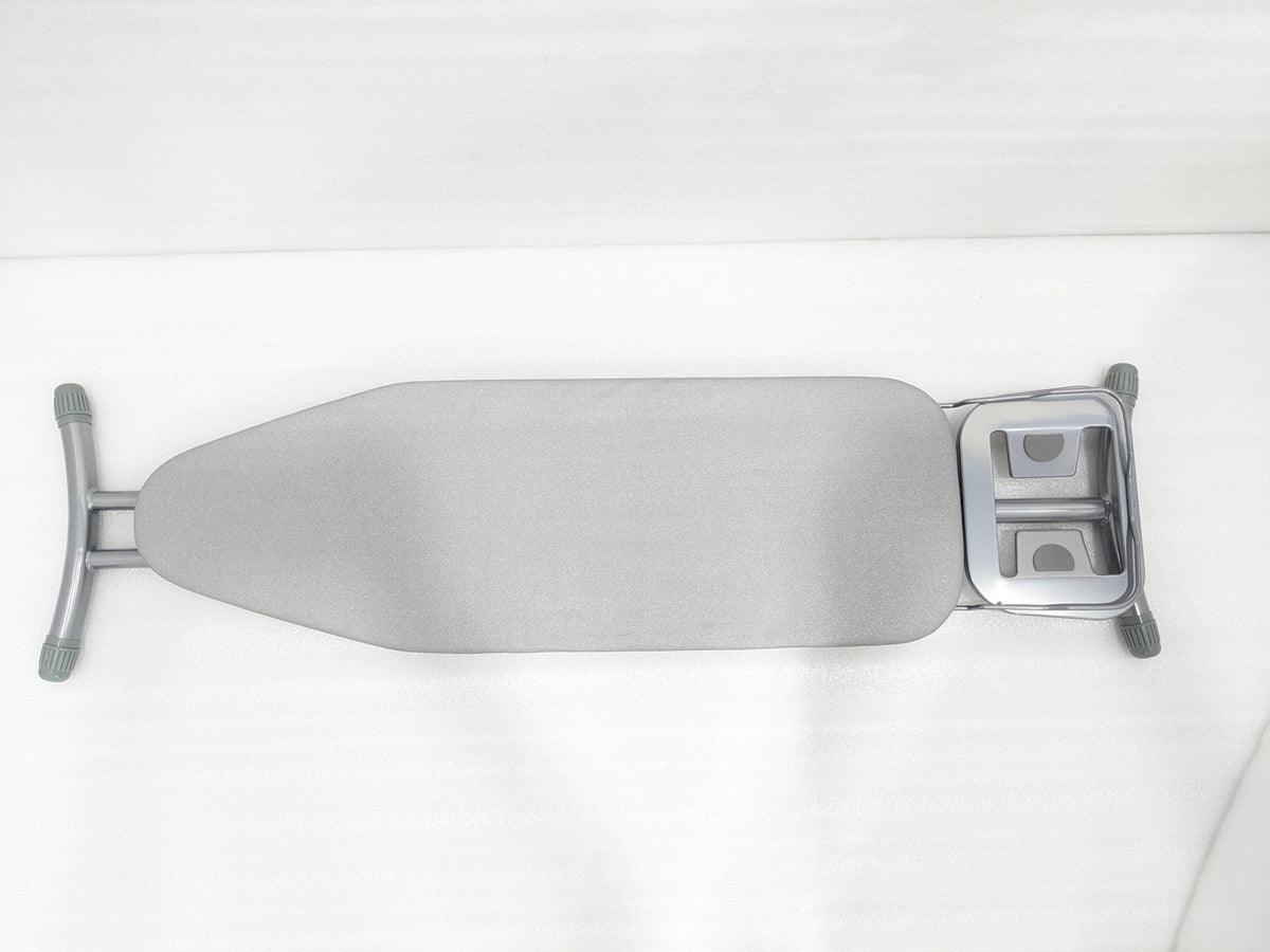 Dolphy grey ironing board from above, showing the cover, iron rest and rubber-capped legs