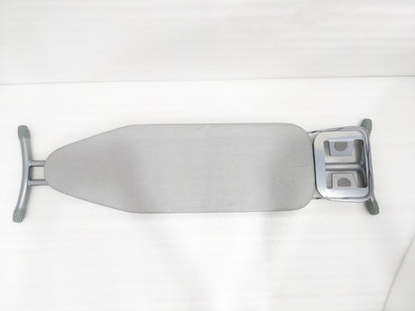 Dolphy grey ironing board from above, showing the cover, iron rest and rubber-capped legs