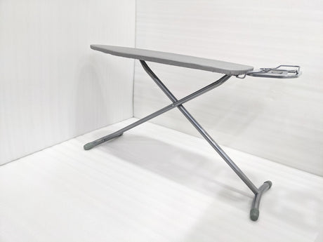 Dolphy grey folding ironing board standing open, side view of the steel X-frame legs