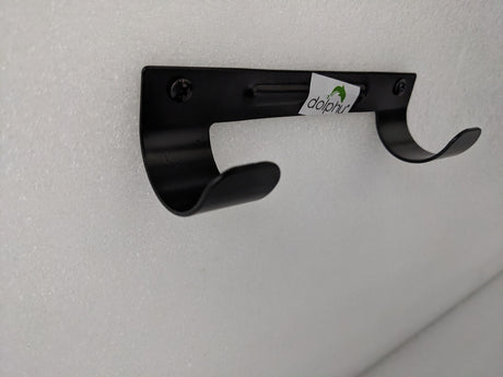 Dolphy black ironing board holder side angle showing the curved hooks