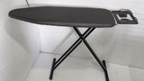 Dolphy large black folding ironing board standing open with its iron rest