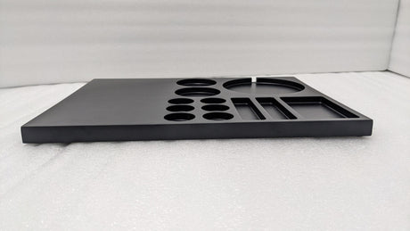 Dolphy black wooden tray side view showing its slim profile