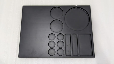 Dolphy black wooden hospitality tray from above, showing all compartments