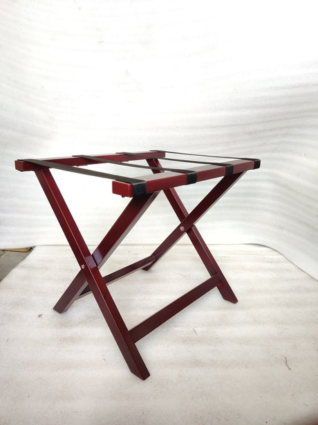 Dolphy cherry red wooden folding luggage rack open, angled view with black straps