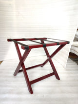 Dolphy cherry wood luggage rack from the side, showing the X-frame legs