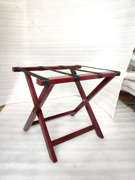 Dolphy cherry wood luggage rack from the side, showing the X-frame legs