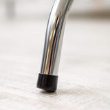 Close-up of a rubber foot cap on the Dolphy luggage rack leg, protecting the floor