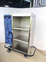 Dolphy housekeeping trolley showing the three open stainless steel shelves