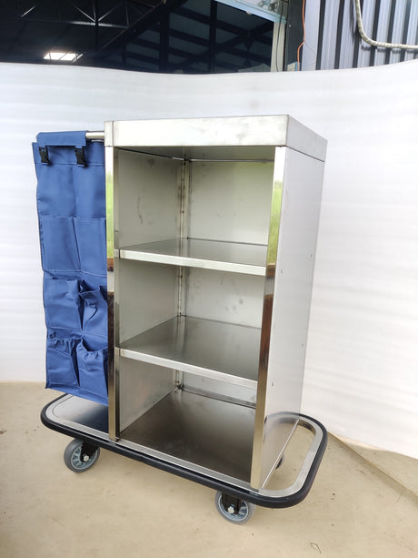 Dolphy housekeeping trolley showing the three open stainless steel shelves