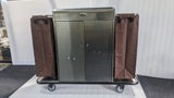 Dolphy stainless steel housekeeping trolley with two brown linen bags and lockable doors