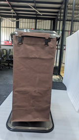 End view of the Dolphy housekeeping trolley showing a brown linen bag