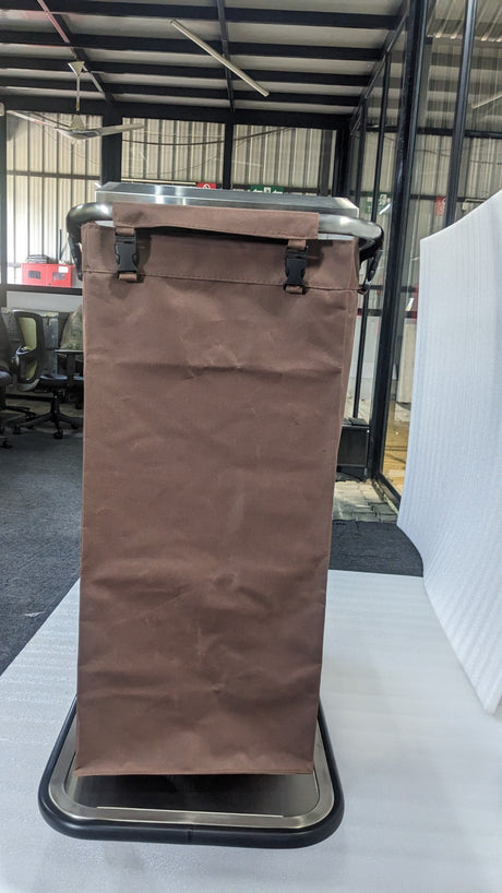 End view of the Dolphy housekeeping trolley showing a brown linen bag