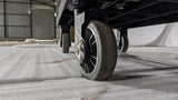 Close-up of a swivel castor wheel on the Dolphy housekeeping cart