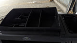Top caddy compartments of the Dolphy black housekeeping cart