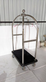 Dolphy hotel luggage trolley at an angle, showing the carpeted deck and hanging rail