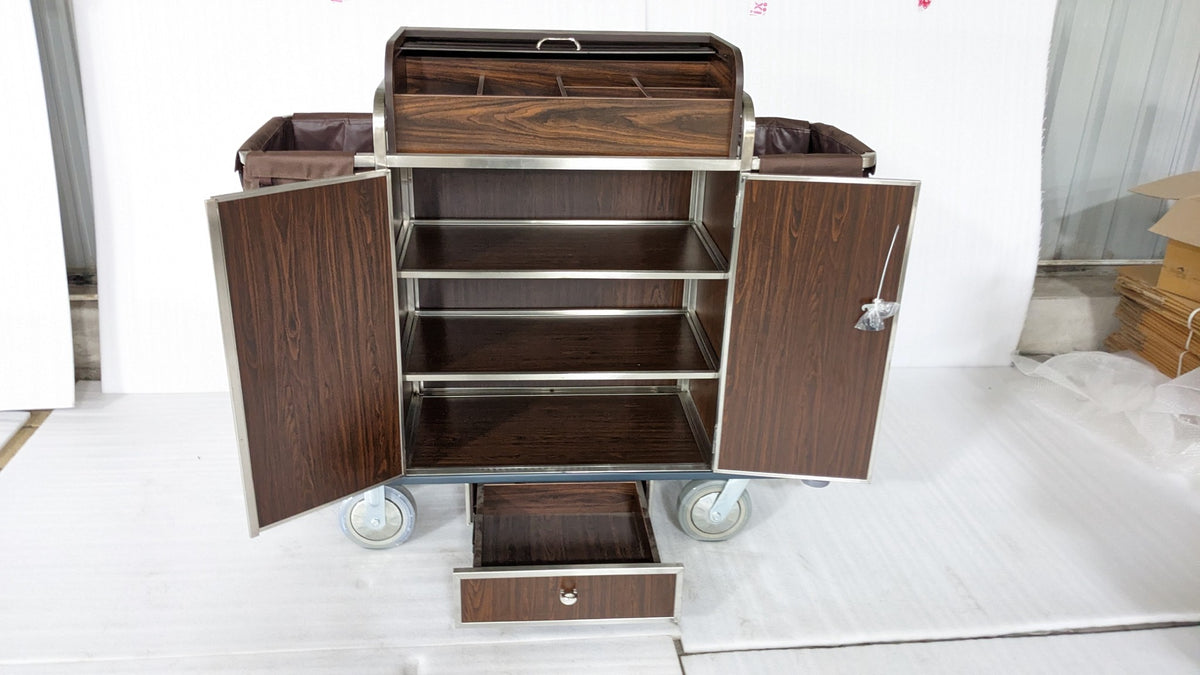 Dolphy housekeeping cart with doors and drawer open, showing the inner shelves