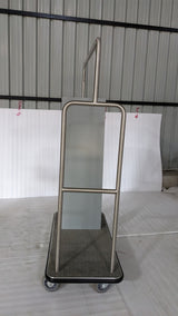 Dolphy laundry delivery trolley, end view showing the frosted panel and carpeted base