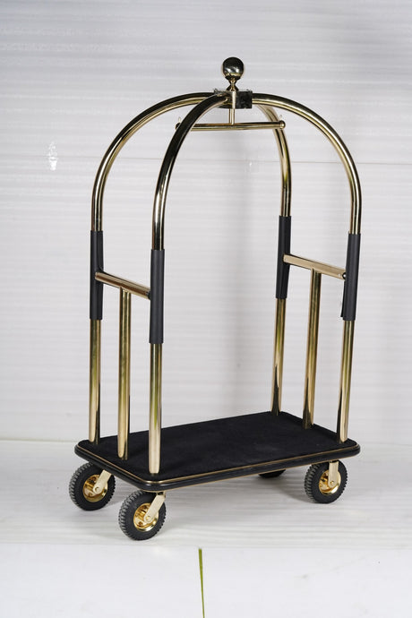 Dolphy gold and black luggage trolley at an angle