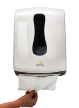 Hand pulling a paper towel from the Dolphy white multifold towel dispenser
