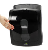 Dolphy black paper towel dispenser front cover being closed onto its back plate