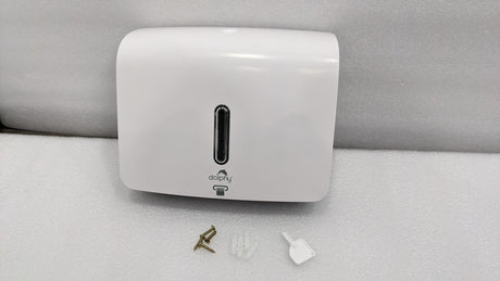 Dolphy white plaza towel dispenser with its key, screws and wall plugs
