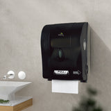 Dolphy black auto-cut paper towel dispenser mounted on a washroom wall beside a basin