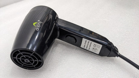 Close-up of the Dolphy black hair dryer body and rear air intake grille