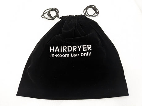 Dolphy black velvet hair dryer bag with drawstring pulled closed