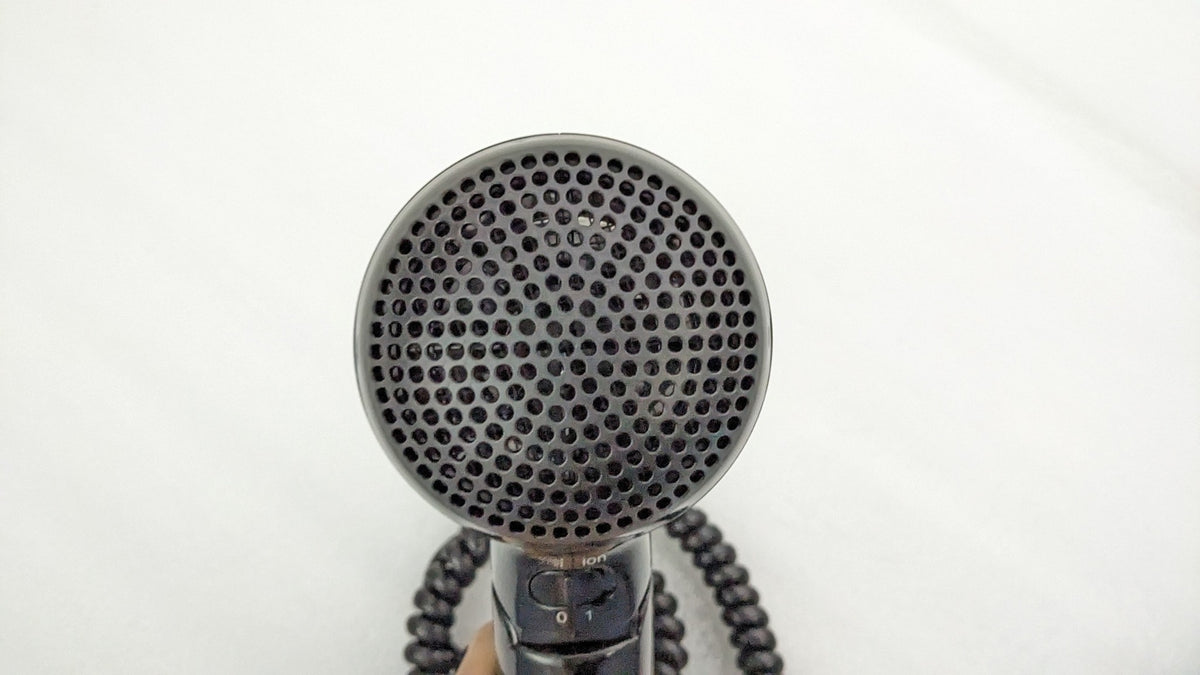 Rear air intake grille of the Dolphy black foldable hair dryer