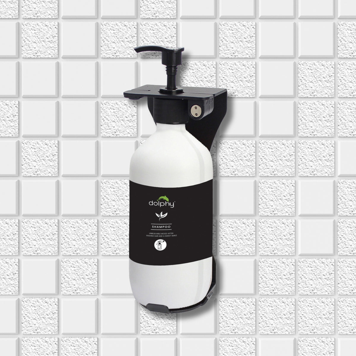 Dolphy wall-mounted pump soap bottle on a white tiled wall