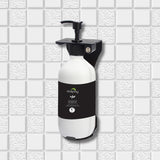 Dolphy wall-mounted pump soap bottle on a white tiled wall