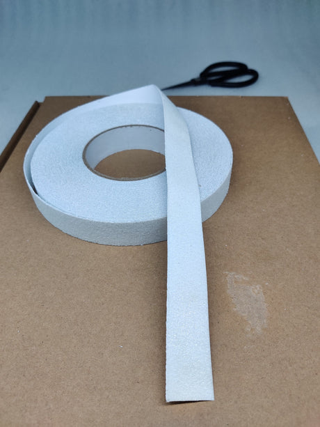 Roll of Dolphy transparent anti-skid safety tape with a length unrolled