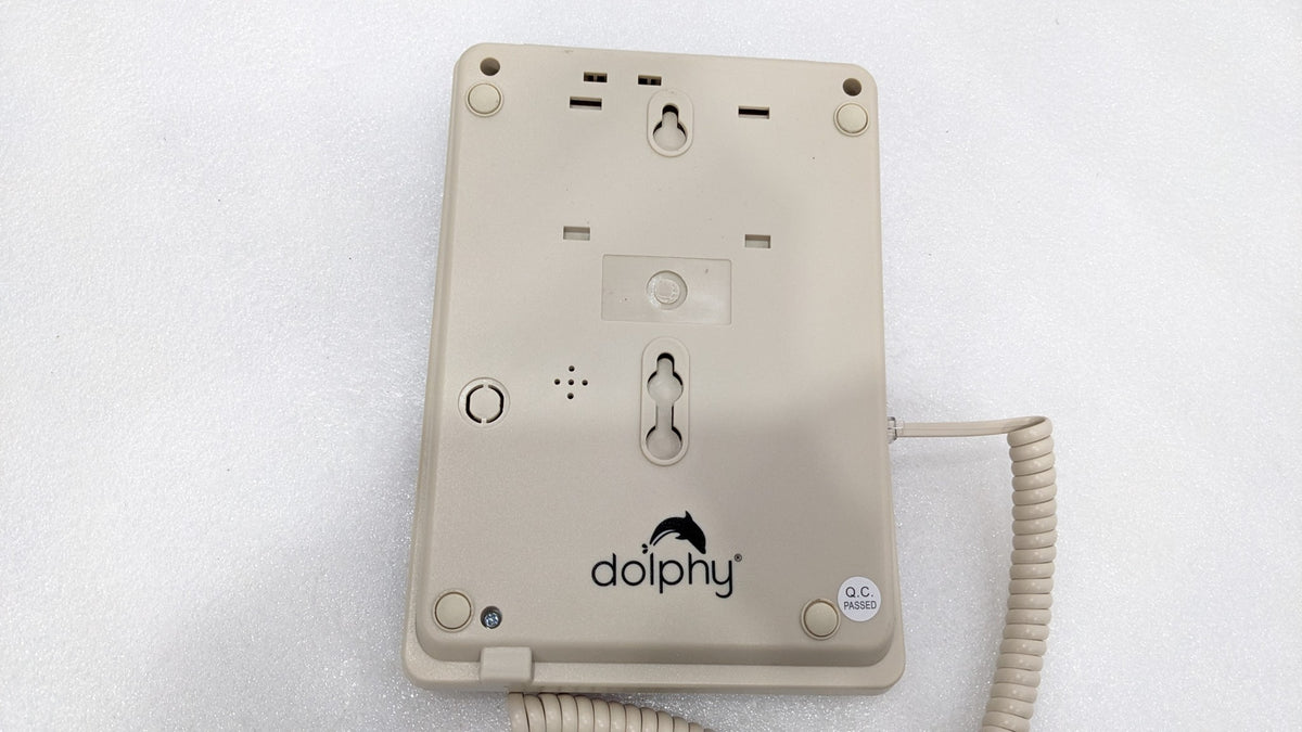 Back of the Dolphy beige telephone showing the wall-mount keyholes
