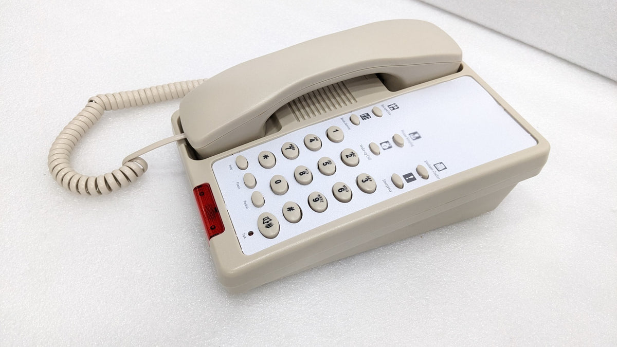 Dolphy beige hotel telephone at an angle, showing the red message light