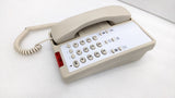 Dolphy beige hotel telephone at an angle, showing the red message light