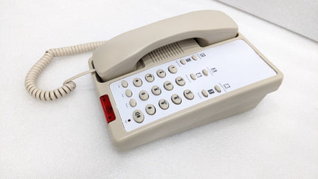 Dolphy beige hotel telephone at an angle, showing the red message light