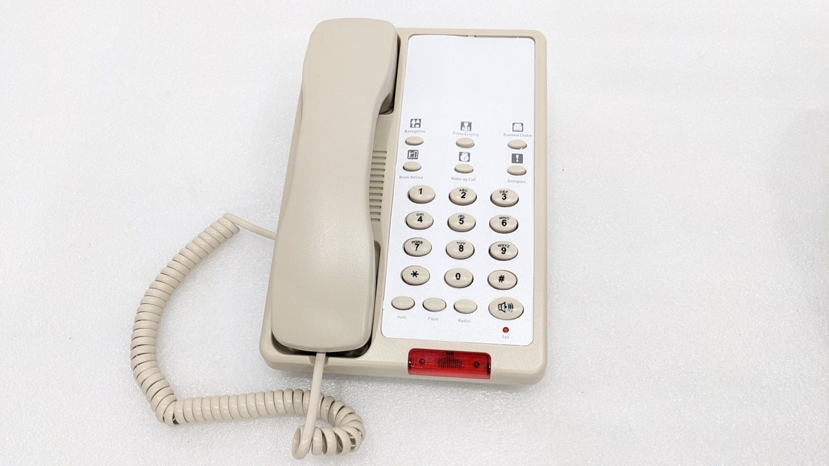 Dolphy beige hotel telephone, front view of the keypad, handset and coiled cord