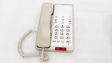 Dolphy beige hotel telephone, front view of the keypad, handset and coiled cord